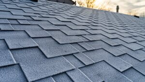 close up view of home's roof with frost on it