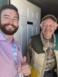 home owner and IRC representative in front of home